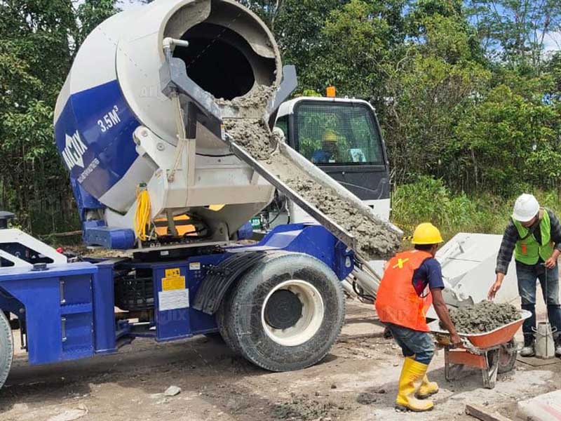 Self Loading Mixer Discharging Concrete